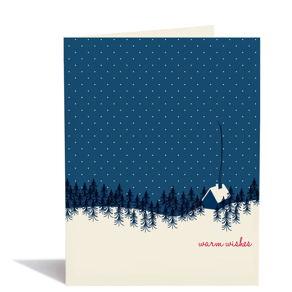 Greeting card with a blue sky, trees, and a house silhouette, featuring 'warm wishes' text.